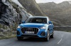 Driving 2019 Audi Q3 45 quattro in Turbo Blue from a frontal view